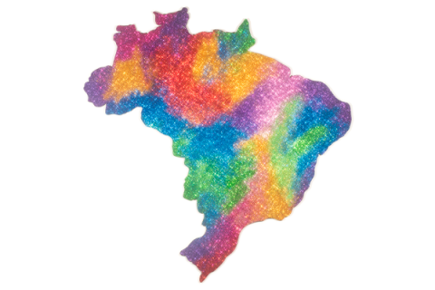 Ilustração do mapa do Brasil preenchido por cores vibrantes em degradê, como rosa, azul, verde, amarelo, laranja e roxo. A superfície tem textura brilhante, semelhante a glitter ou purpurina, criando efeito luminoso e festivo. O fundo é cinza-claro e liso, destacando o contorno colorido do país no centro da imagem.